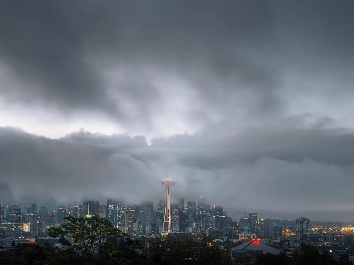 Dramatic Seattle skyline emerging from cloudy skies — limited edition fine art print by Ludwig Favre Dramatic Seattle skyline emerging from cloudy skies — limited edition fine art print by Ludwig Favre