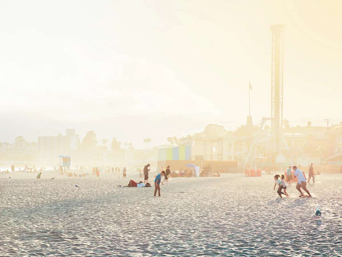 Beach scene with people playing on the sand, warm light — limited edition fine art print by Ludwig Favre Beach scene with people playing on the sand, warm light — limited edition fine art print by Ludwig Favre