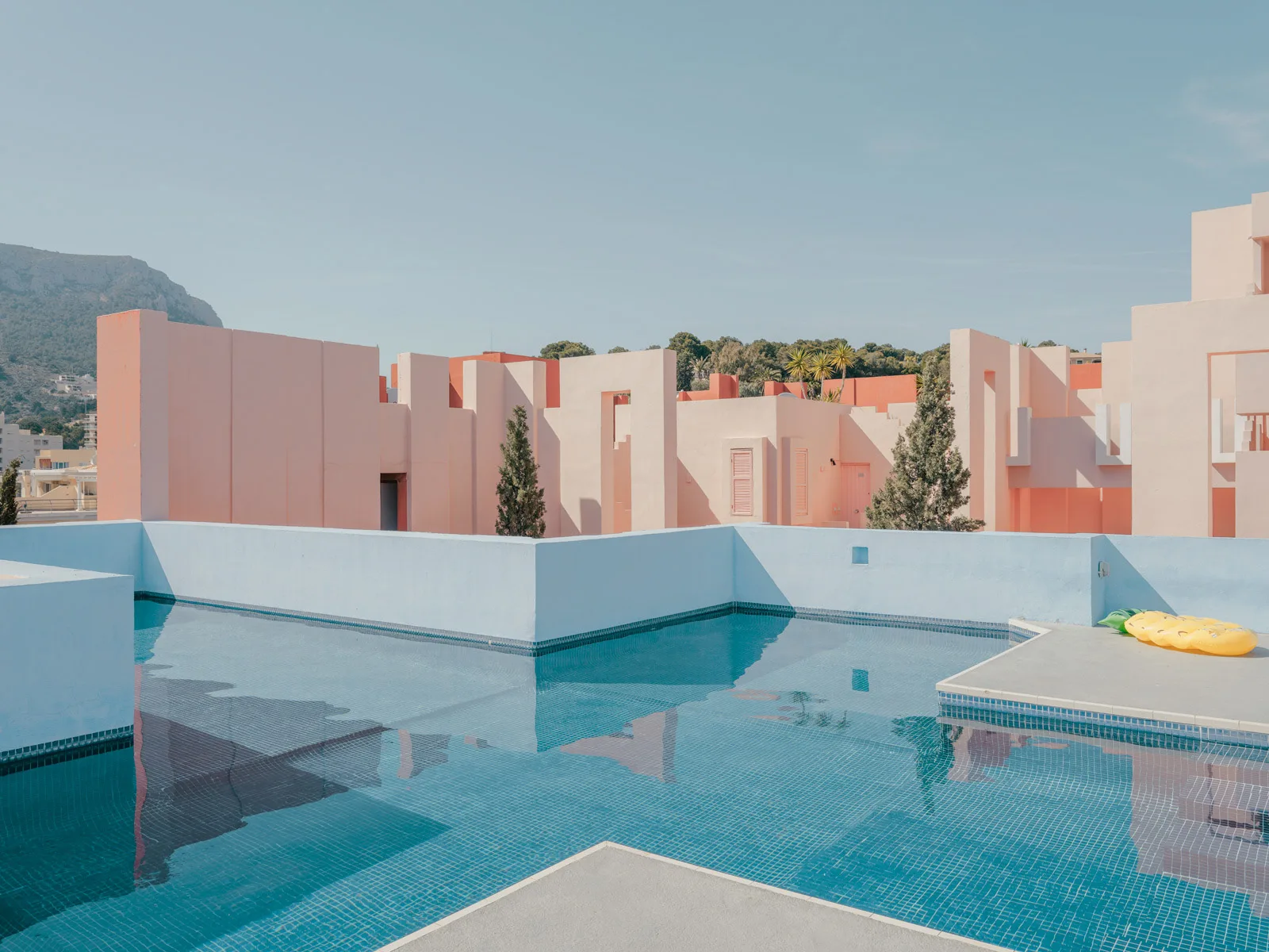 Modern swimming pool complex with warm light and turquoise water — limited edition fine art print by Ludwig Favre Modern swimming pool complex with warm light and turquoise water — limited edition fine art print by Ludwig Favre