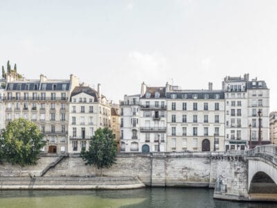 Classic Parisian buildings along the Seine riverbank, captured in soft light — limited edition fine art print by Ludwig Favre