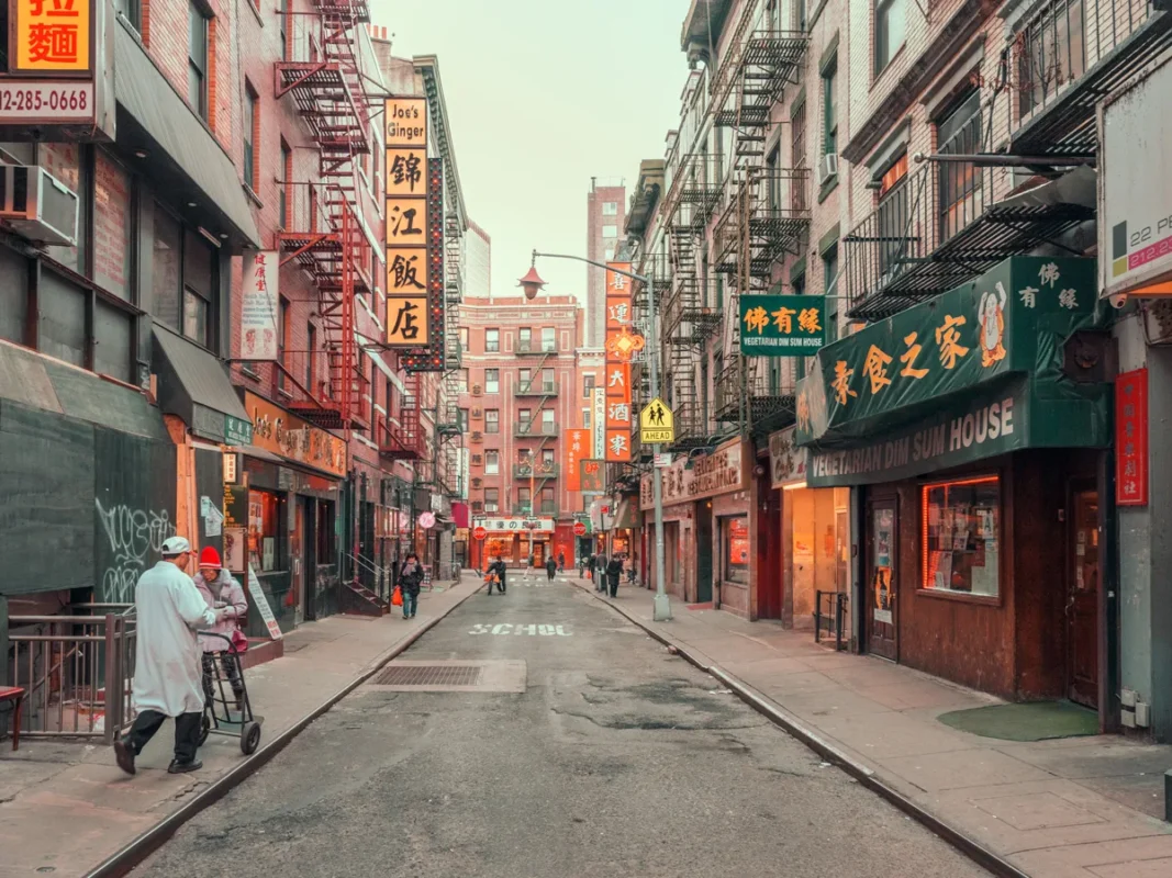 Street scene in New York's Chinatown with red lanterns and neon signs, fine art print by Ludwig Favre