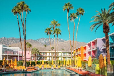 Colorful mid-century hotel with palm trees, Palm Springs, limited edition fine art print by Ludwig Favre