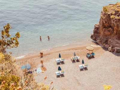 View from above of Positano beach with turquoise water, fine art print by Ludwig Favre