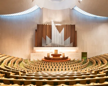 Circular auditorium of a Chicago church with wooden pews — limited edition fine art print by Ludwig Favre