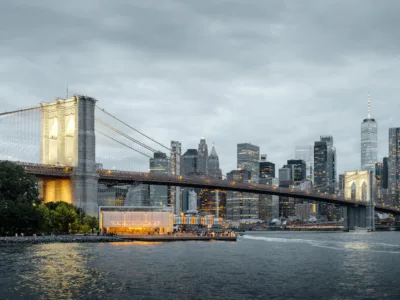 The Brooklyn Bridge and Manhattan skyline at dusk with a river boat — limited edition fine art print by Ludwig Favre