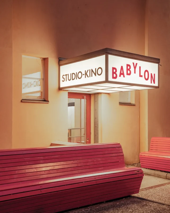 Berlin By Ludwig Favre Fine Art Prints Babylon Cinema in Berlin, with red benches and a neon sign — limited edition fine art print by Ludwig Favre