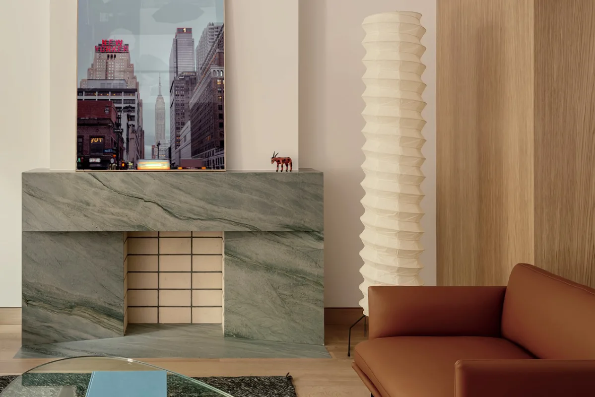 New York City street scene displayed above a marble fireplace — limited edition fine art print by Ludwig Favre