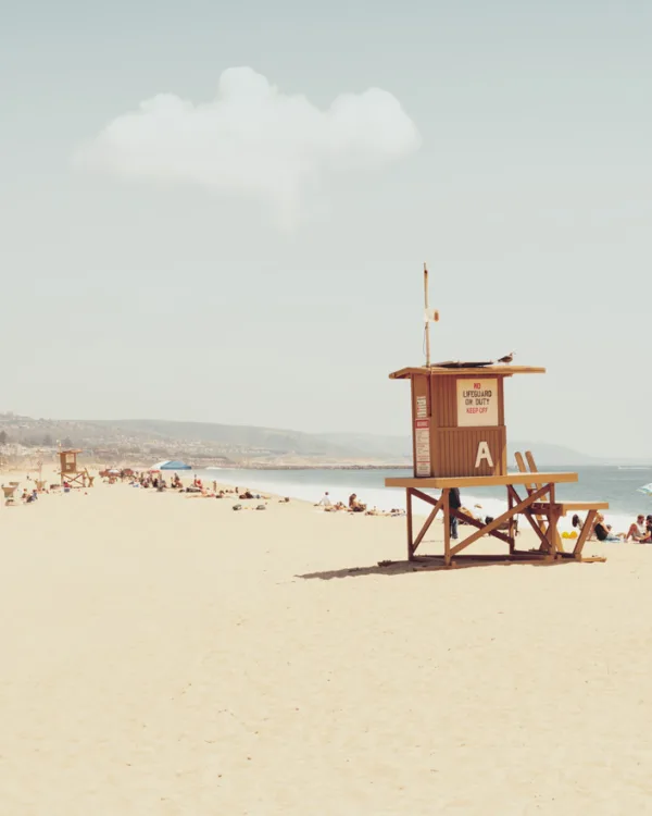 Wooden lifeguard tower on a sandy beach at Balboa Island, California — limited edition fine art print by Ludwig Favre