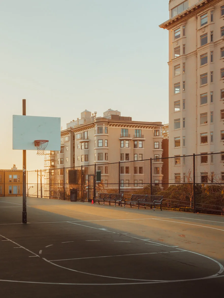 Empty San Francisco basketball court bathed in golden light — limited edition fine art print by Ludwig Favre