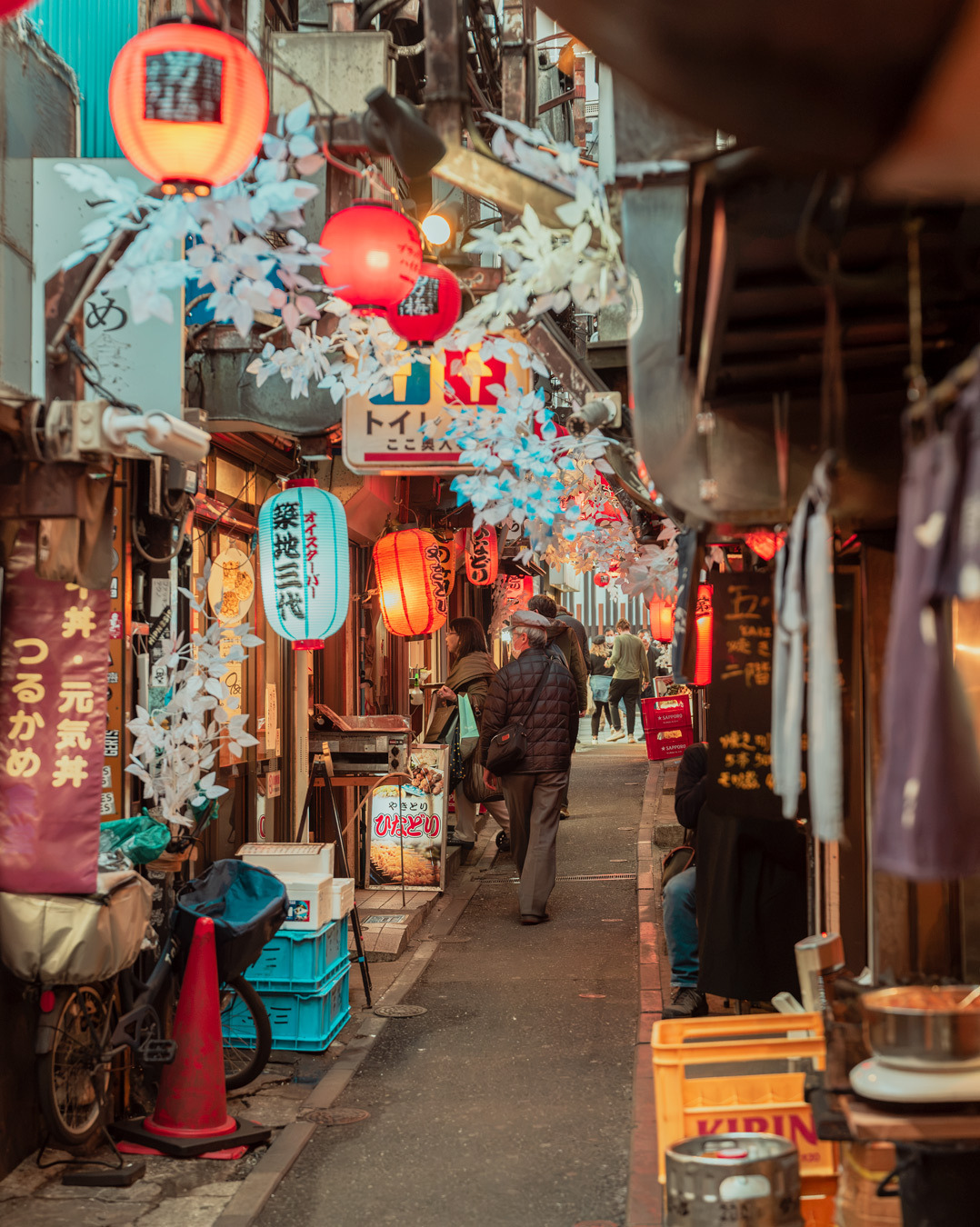 Tokyo street lined with lanterns in warm light — limited edition fine art print by Ludwig Favre
