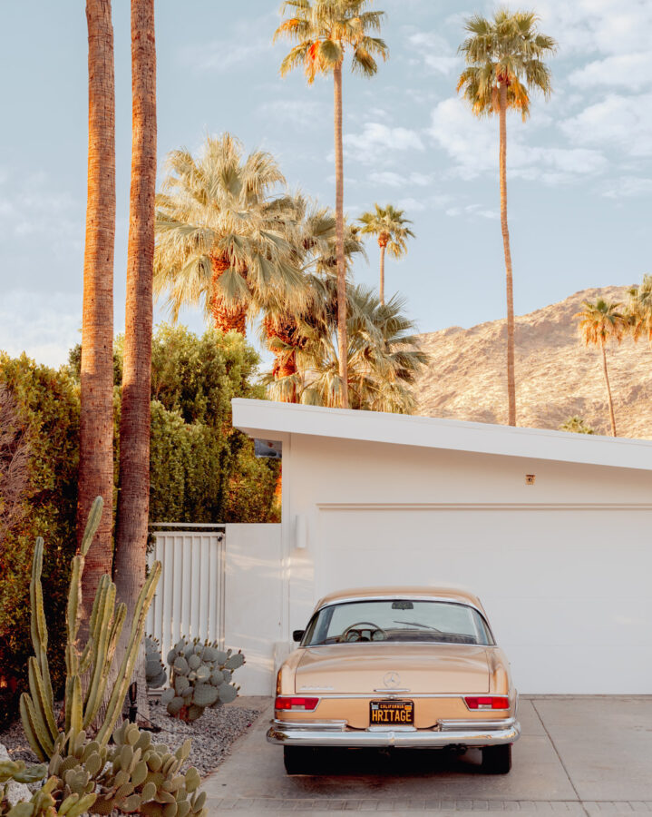 Classic car parked in sunlit desert driveway — limited edition fine art print by Ludwig Favre Classic car parked in sunlit desert driveway — limited edition fine art print by Ludwig Favre