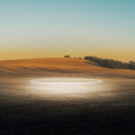 Plowed Oregon field under dramatic sunlight — limited edition fine art print by Ludwig Favre
