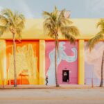 Miami pink wall print: pink, orange and lavender panels with hand murals and three palm trees