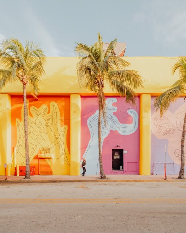 Miami pink wall print: pink, orange and lavender panels with hand murals and three palm trees