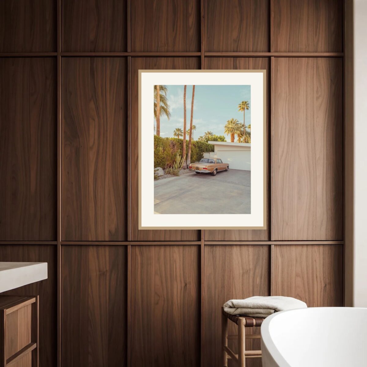 Vintage car in front of a mid-century modern home with palm trees, Palm Springs, fine art print shown on a living room wall